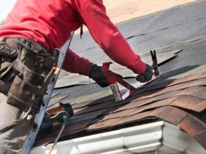 Skilled professionals performing residential roof replacement in Ridgewood, NJ
